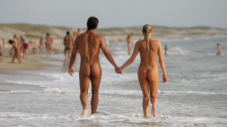 Family naturism on the beach