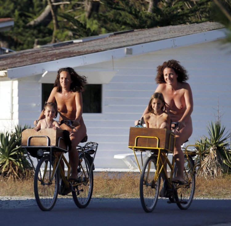 Family nudism on a bicycle