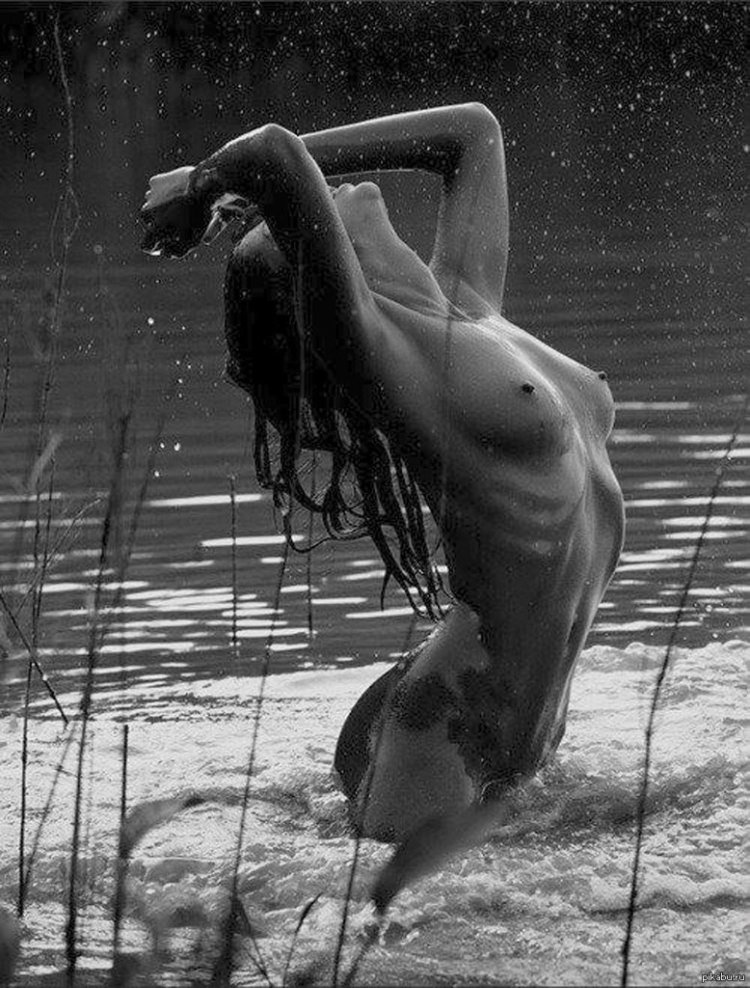 Naked women in the rain