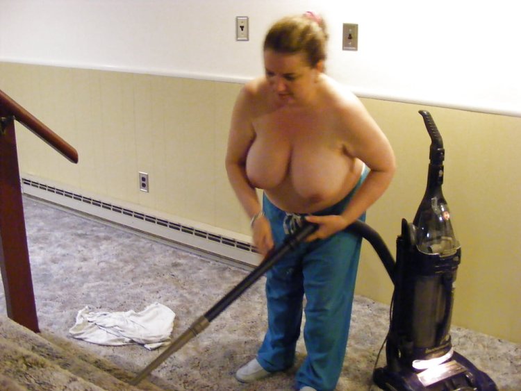A naked fat woman is cleaned