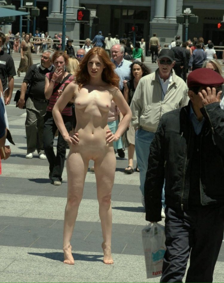 The girl undresses in public