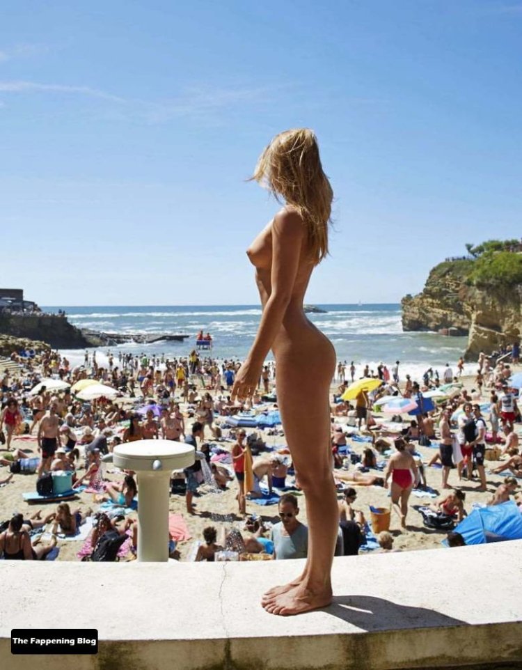 Beautiful naked women on a public beach