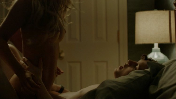 Hannah Ware rides on a man at the boss