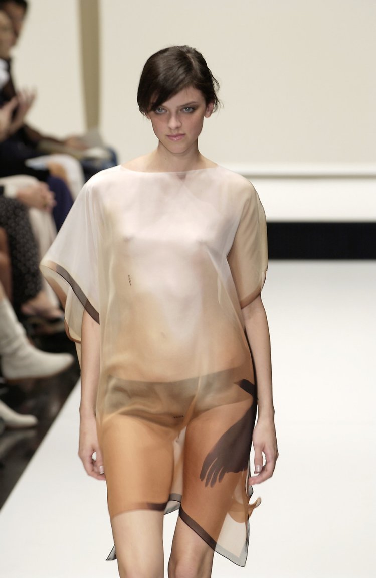 Transparent blouse on a naked body