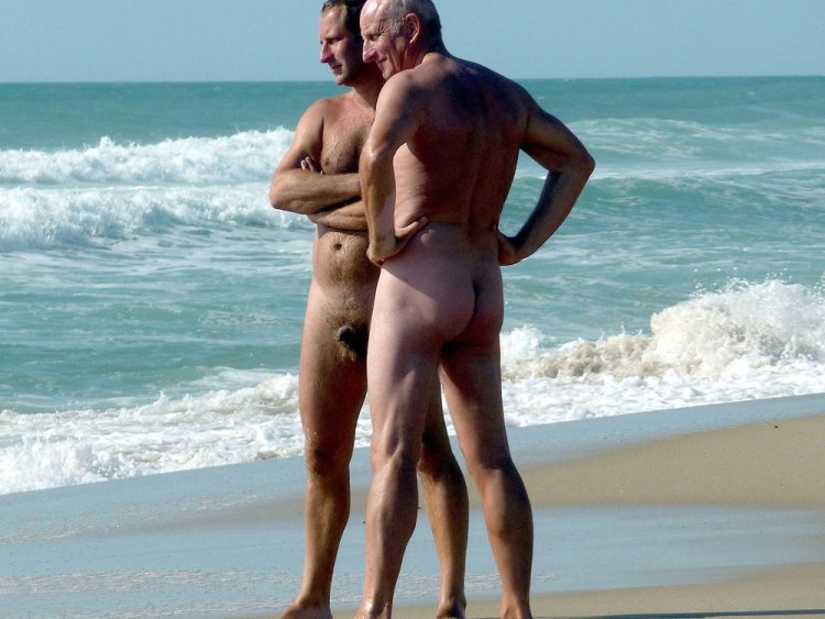 Naked young guys on the beach