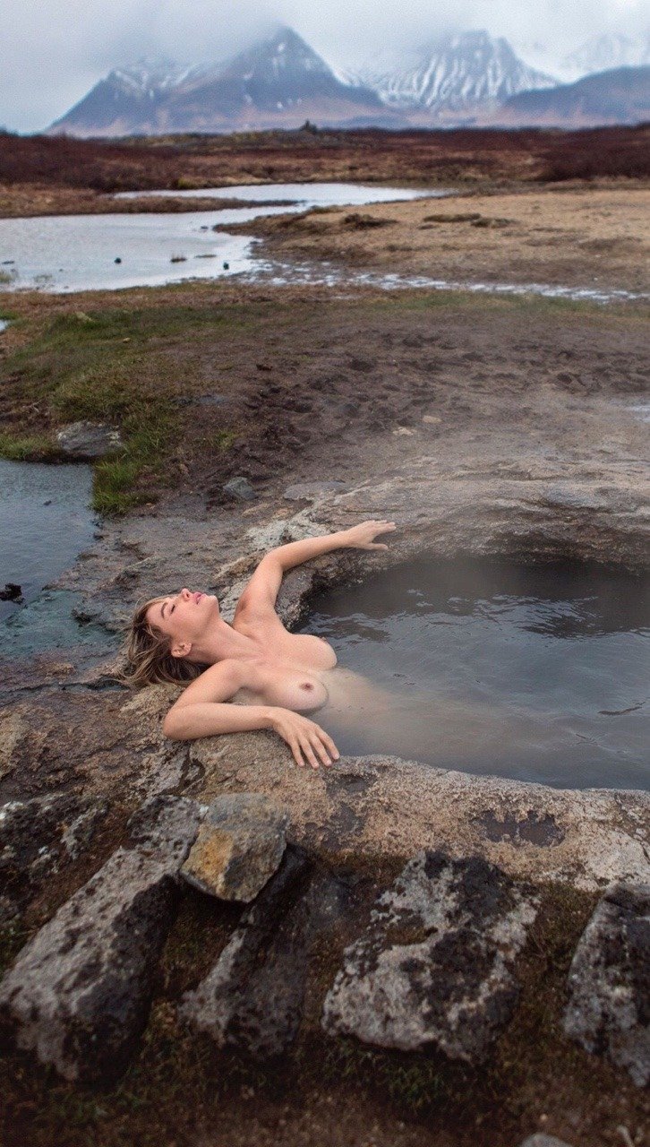 Naked women in nature in the mountains