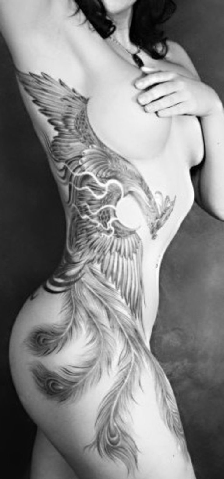 Tattoo Phoenix on the hip