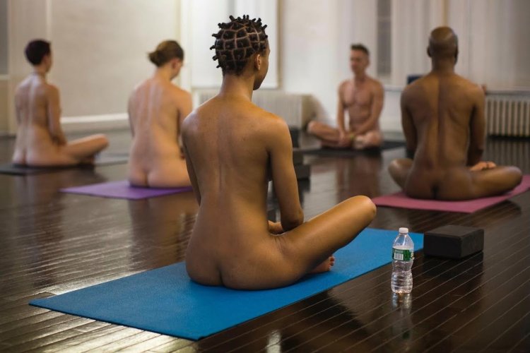 Naked girls are engaged in yoga