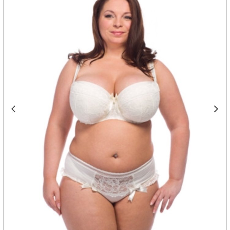 Old big breasts in a bra