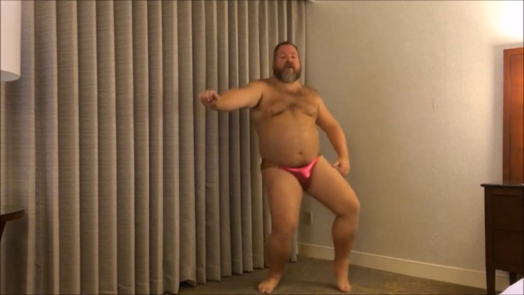 A fat guy in shorts dancing