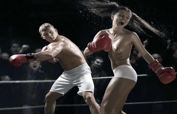 Woman against a man in the ring
