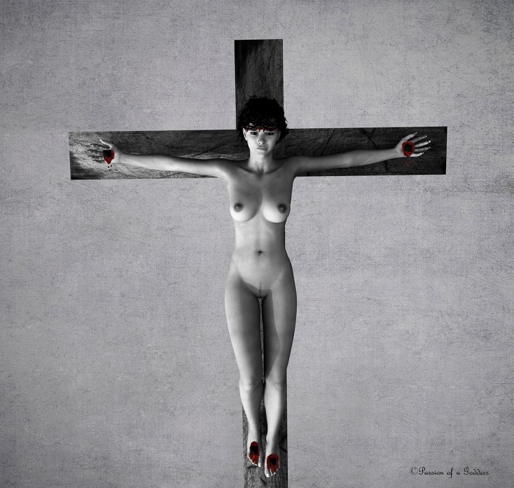 BDSM crucified at a height in the forest