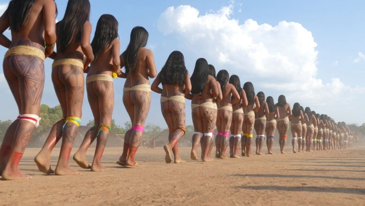 Naked white woman in a tribe