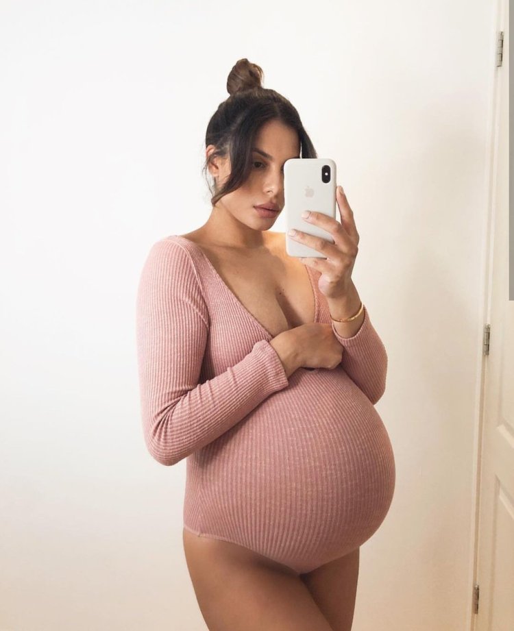 Huge breasts of pregnant women