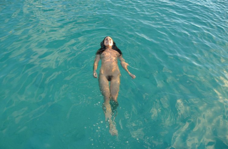 Nudist in the water naked