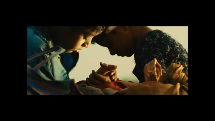 Mia Calphide drawing with a pencil