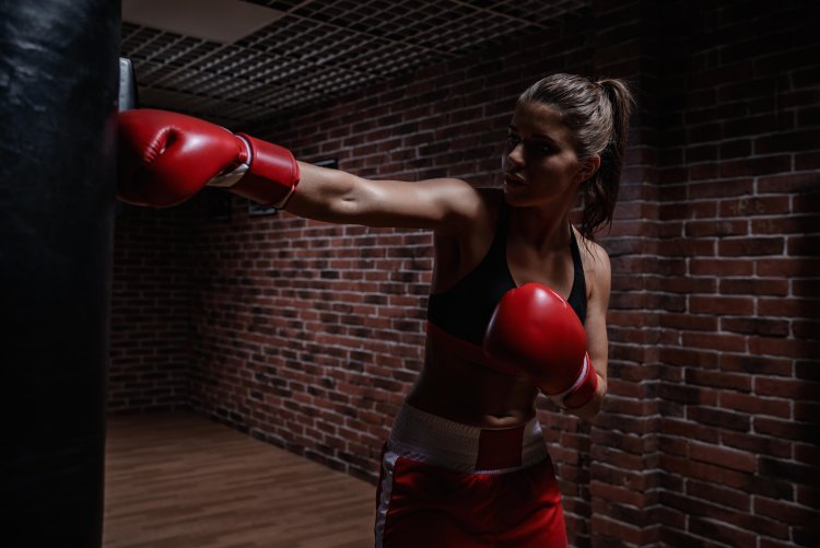 Women's box with bare breasts