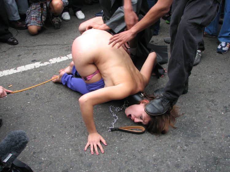 Naked women beat a woman