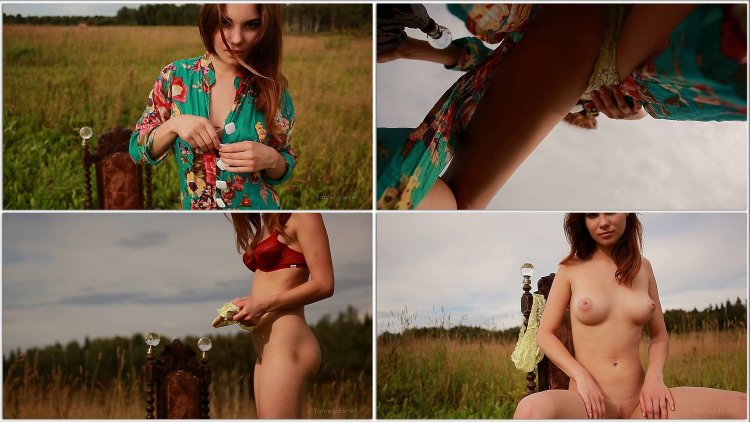 Naked woman in a forest glade