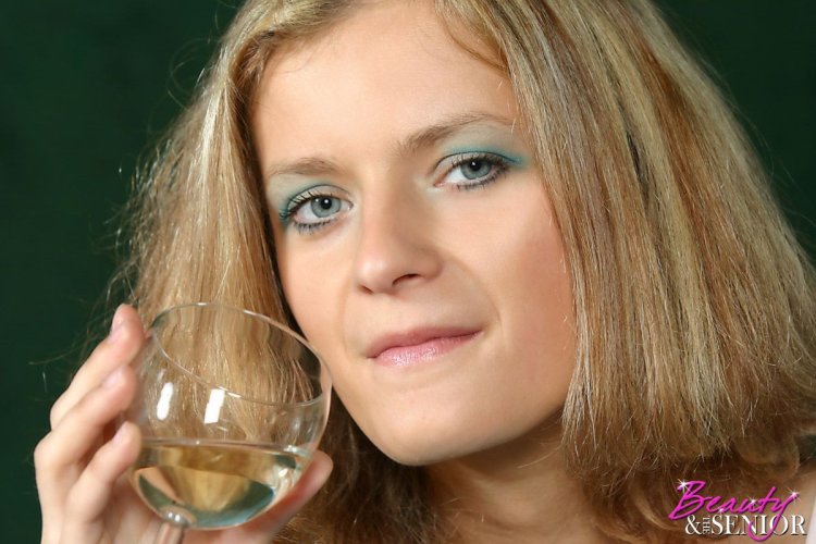 Old man and girl kiss