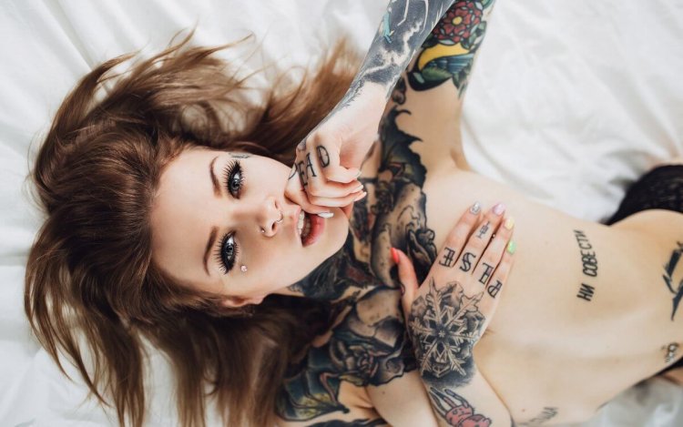 Naked women with tattoos