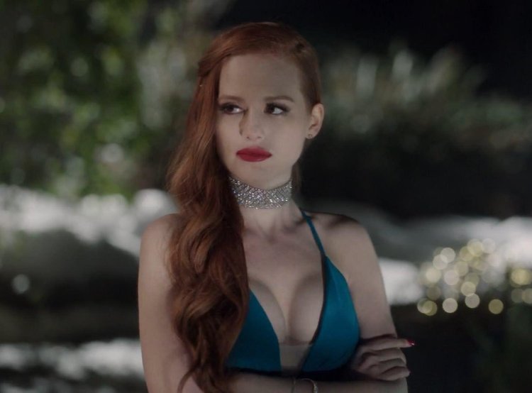 GIF Sheril Blossom puts on a jacket