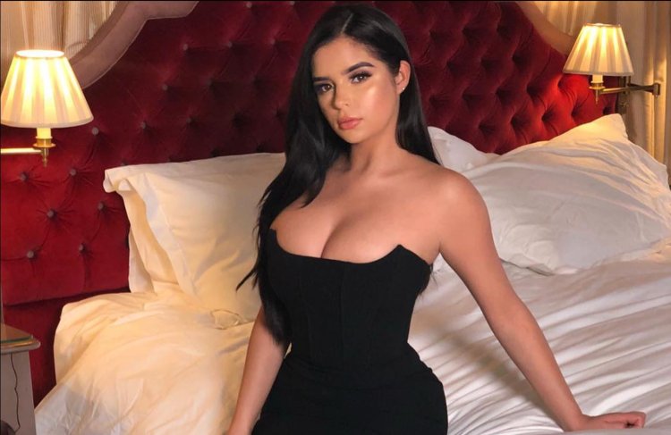 Demi Rose in bed