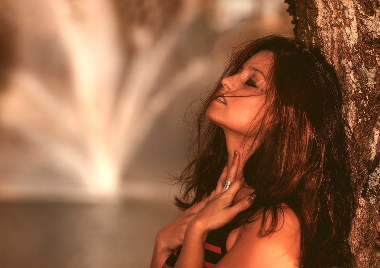 Rayre singer in a swimsuit