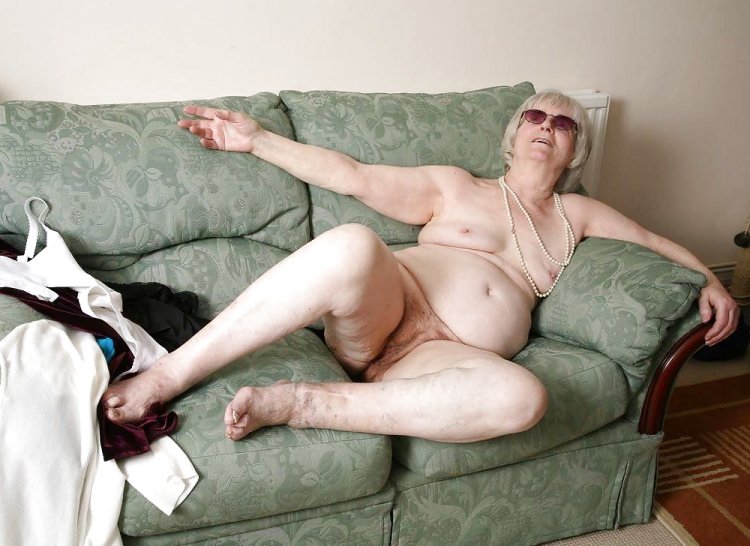 Naked old woman in a store