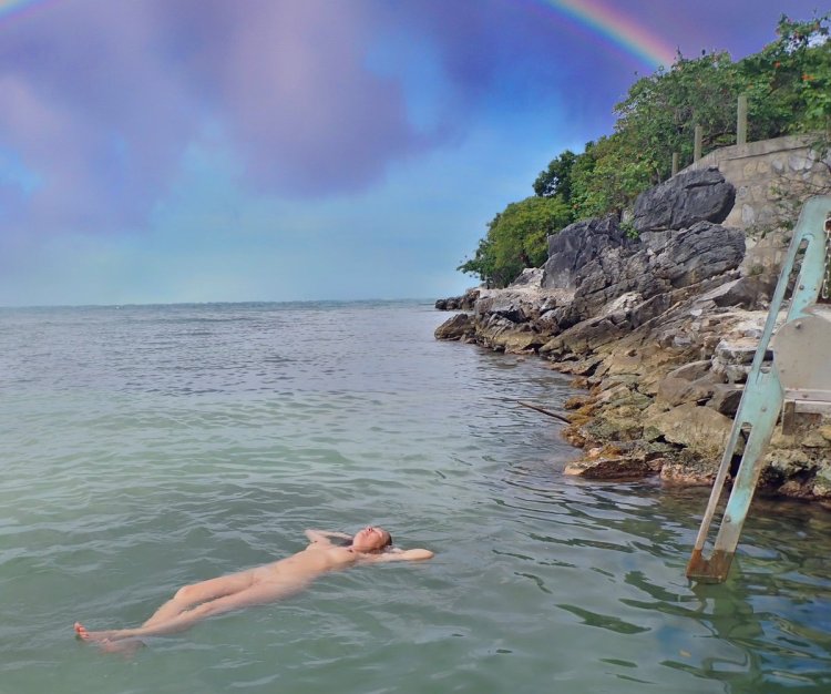 Naturistin. Holiday and dog