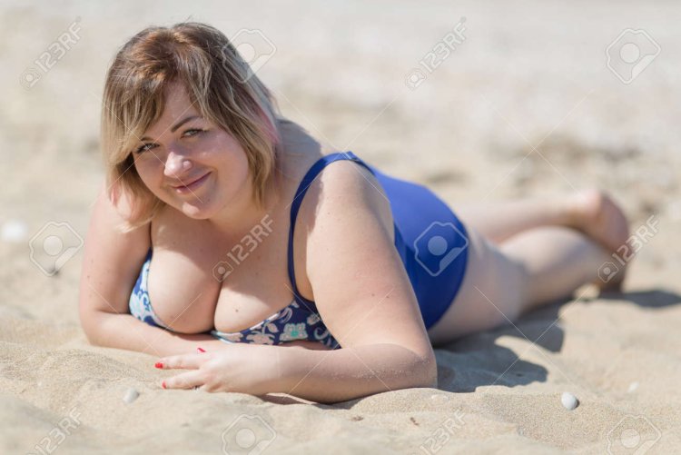 Pyshki lying in a swimsuit