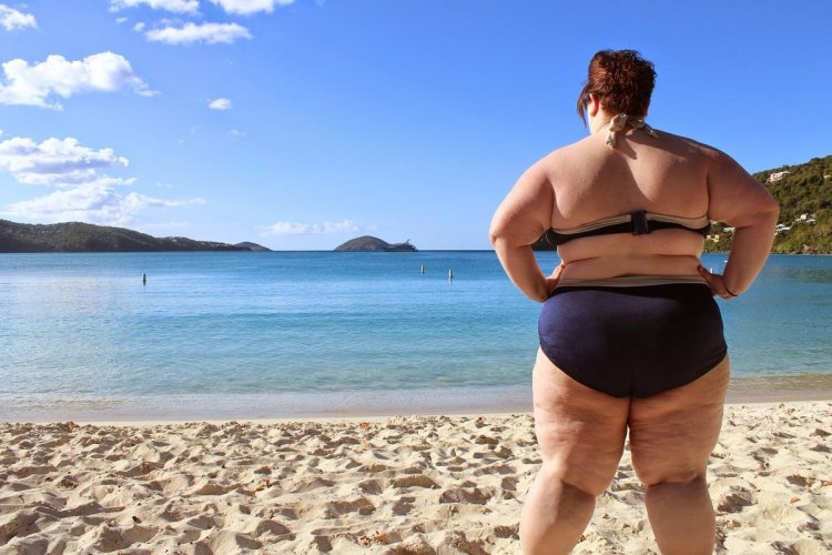 Fat people on the beach