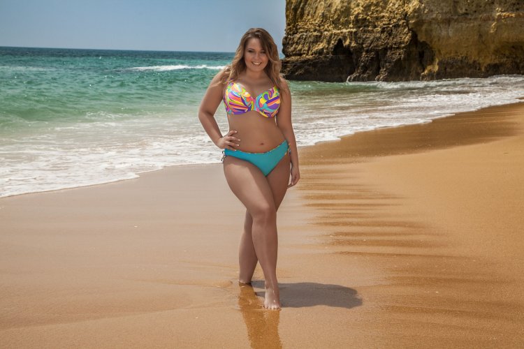 Full women on the beach