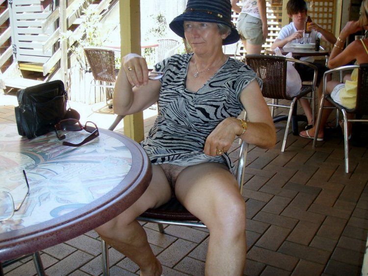 Naked old women in a public place