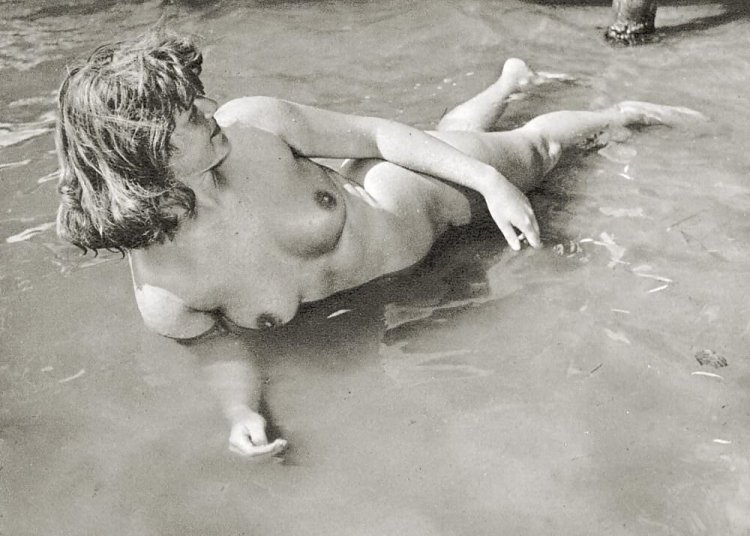 Naked on a village beach