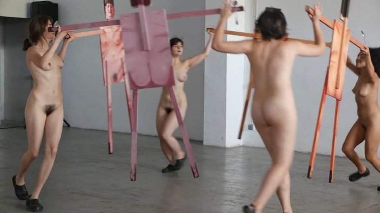 Naked actresses on the stage of the theater