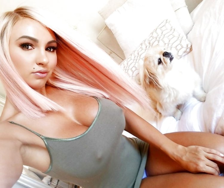 In a tight dress without a bra