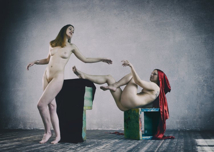 Naked actresses on the stage of the theater