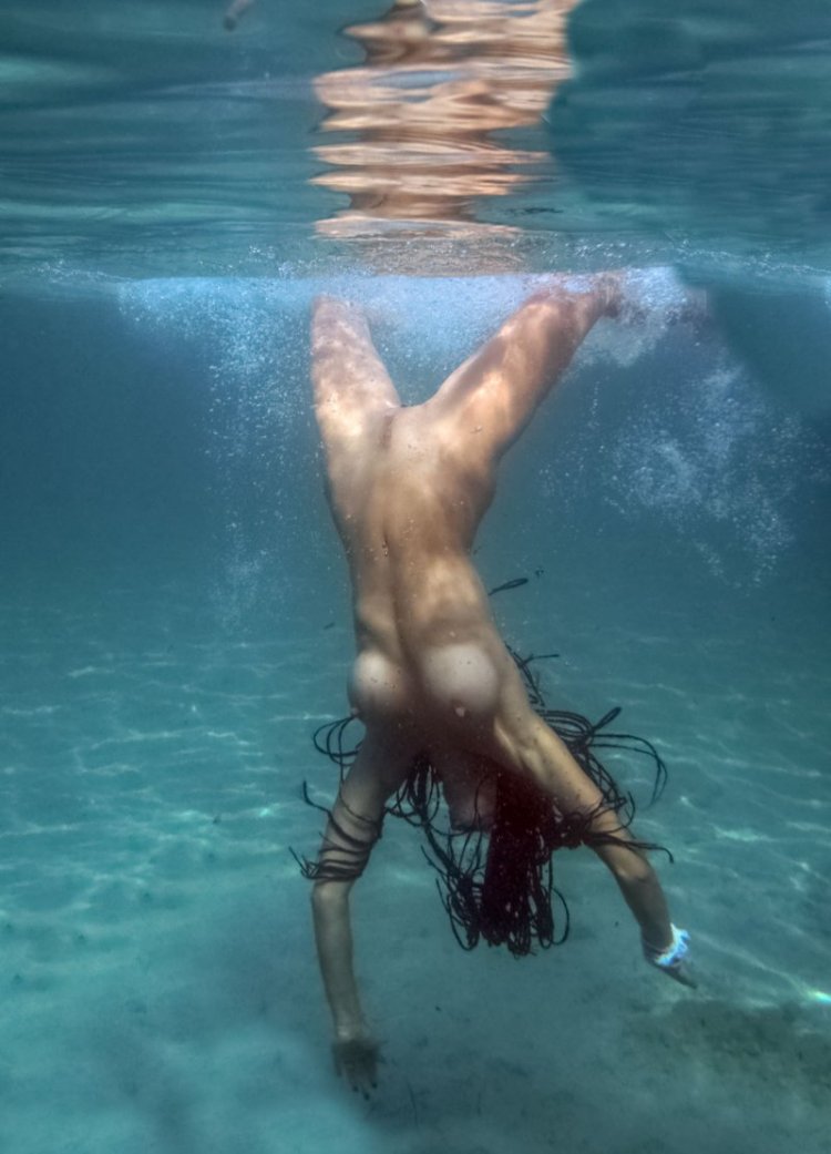 Girls Topless underwater