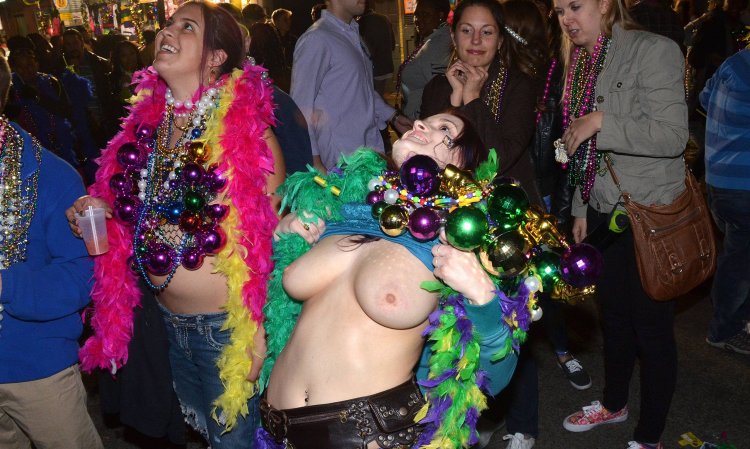 Expose breasts at the festival