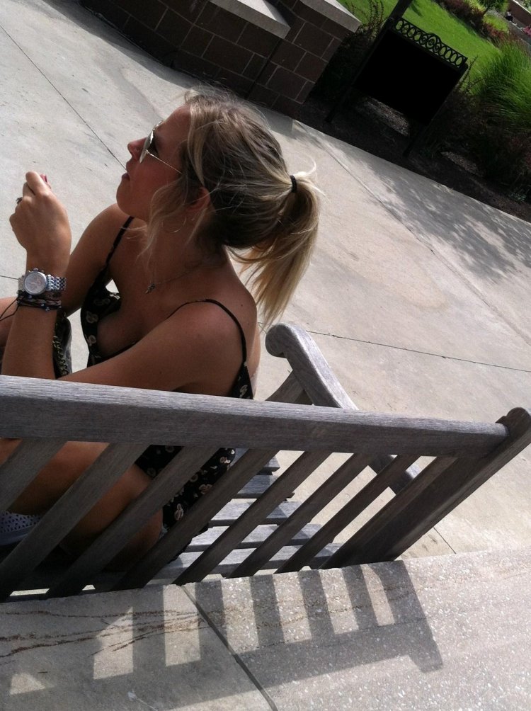 Girl with a neckline on a bus