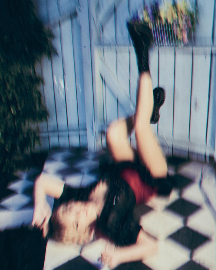 Maddy Siegler in a swimsuit in the clip of Chandelier