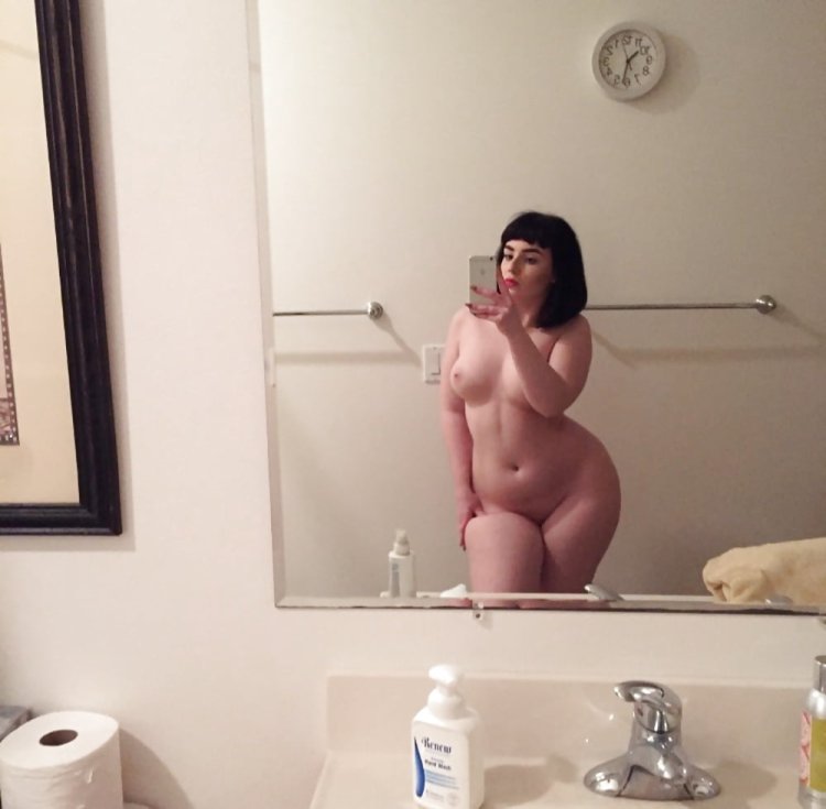 Big boobs in front of the mirror