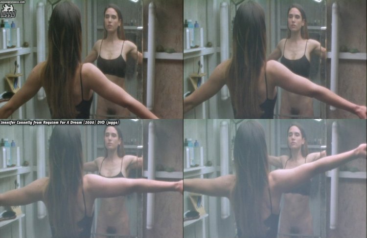 Jennifer Connelli with a cigarette