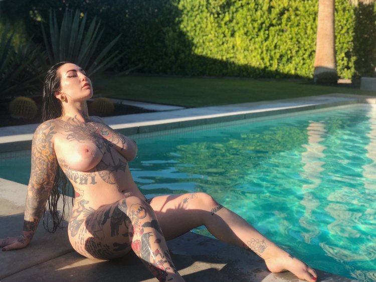 Naked emo with legs spread