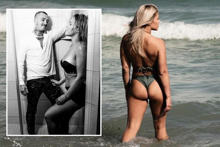 Page Wansant in a swimsuit with her husband