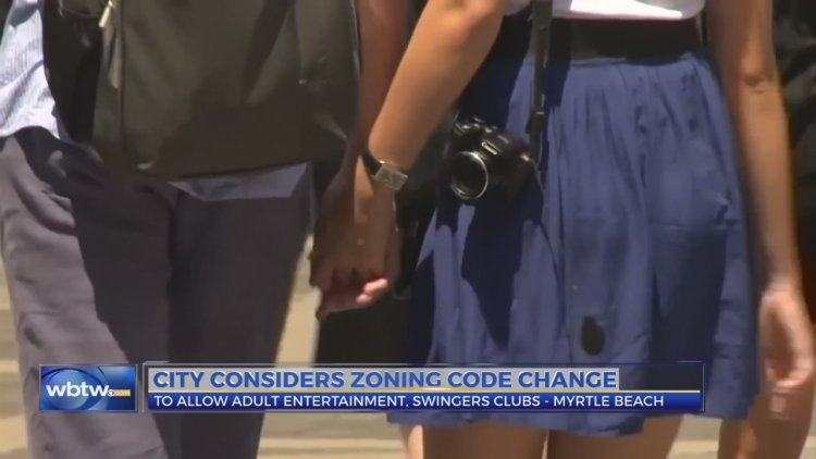 The couple tanes on the beach