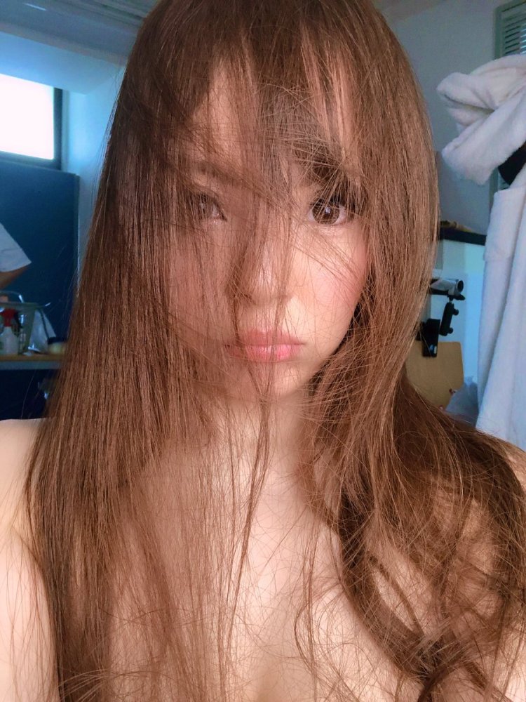 Hitomi Tanaka in a bra