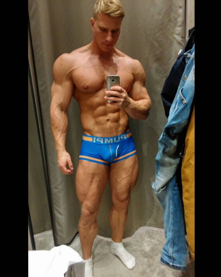 Muscular guys in thongs