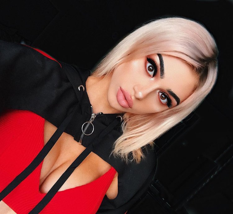 Kristen Hancher in a blue dress